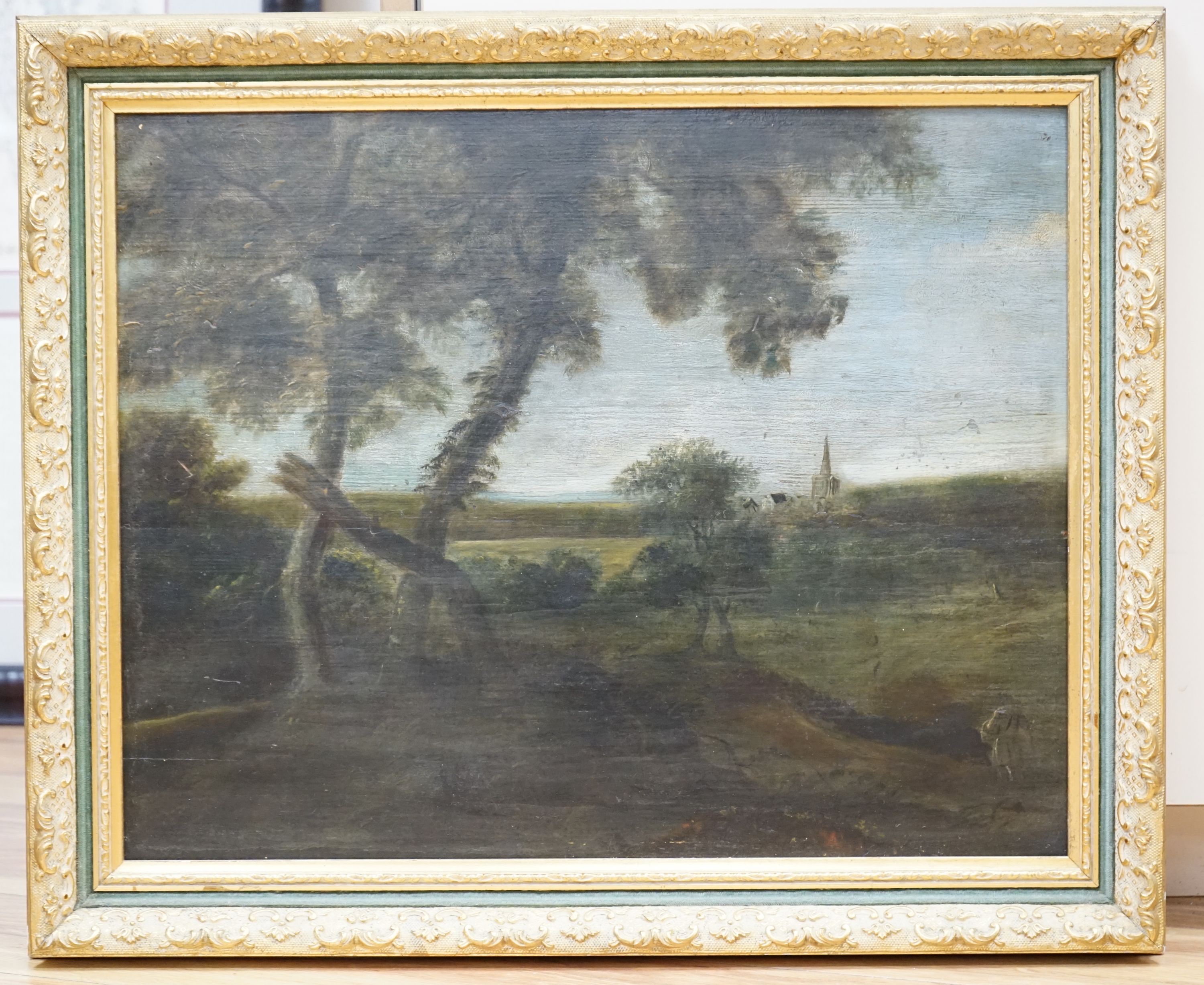 19th century English School, oil on wooden panel, Traveller and church in a landscape, 40 x 50cm